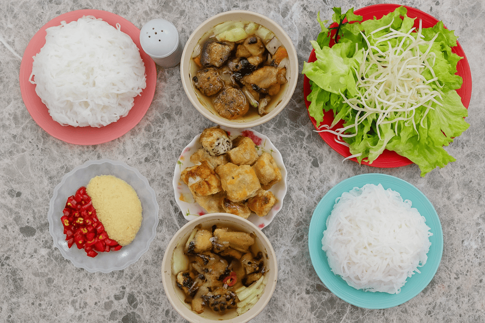 Tucked away in a small alley, Bun Cha Hang Quat is a must-visit spot for food lovers seeking an authentic taste of Hanoi
